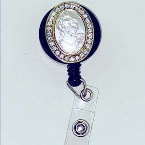 Retractable badge holder